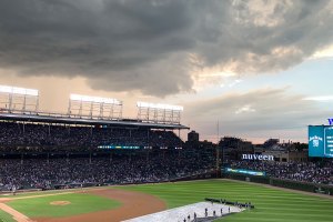 Tarp being put on field - June 24, 2019