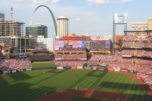 St. Lous  skyline and Arch from behind home plate at Busch Stadium  with shadows on the field - June 1, 2019