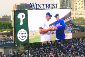 Joe Madden and Joe Namath on the left field scoreboard.